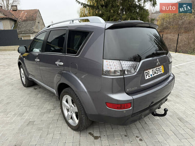 Серый Мицубиси Аутлендер, объемом двигателя 2.2 л и пробегом 162 тыс. км за 10000 $, фото 11 на Automoto.ua