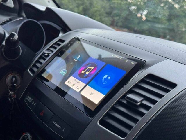 Серый Мицубиси Аутлендер, объемом двигателя 2.4 л и пробегом 171 тыс. км за 9199 $, фото 18 на Automoto.ua