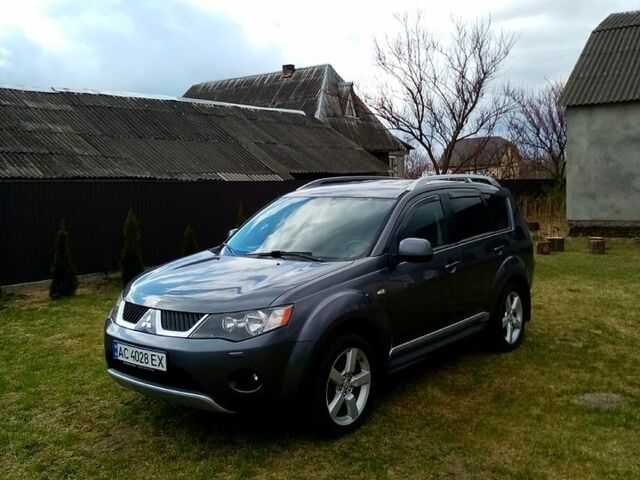 Серый Мицубиси Аутлендер, объемом двигателя 2.4 л и пробегом 307 тыс. км за 9200 $, фото 4 на Automoto.ua