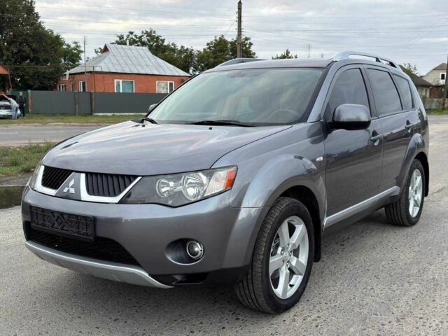 Серый Мицубиси Аутлендер, объемом двигателя 2.4 л и пробегом 171 тыс. км за 9199 $, фото 2 на Automoto.ua