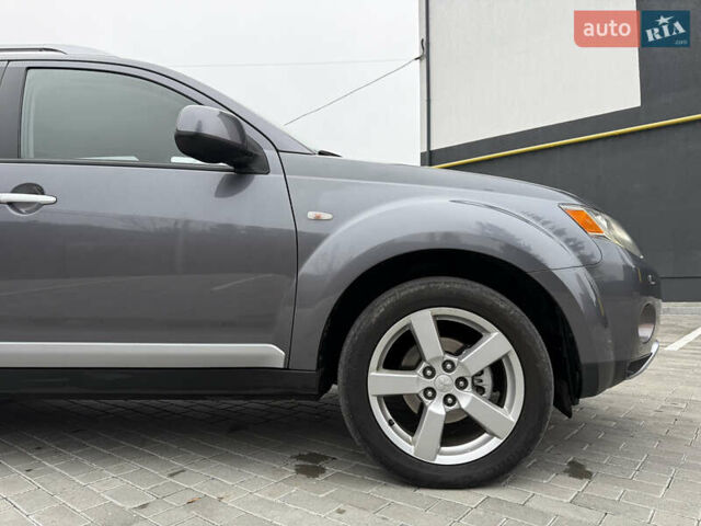 Серый Мицубиси Аутлендер, объемом двигателя 2.2 л и пробегом 162 тыс. км за 10000 $, фото 18 на Automoto.ua