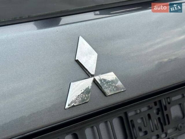 Серый Мицубиси Аутлендер, объемом двигателя 2.4 л и пробегом 172 тыс. км за 9199 $, фото 17 на Automoto.ua
