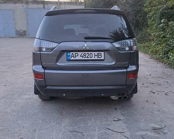 Серый Мицубиси Аутлендер, объемом двигателя 2 л и пробегом 275 тыс. км за 8000 $, фото 2 на Automoto.ua