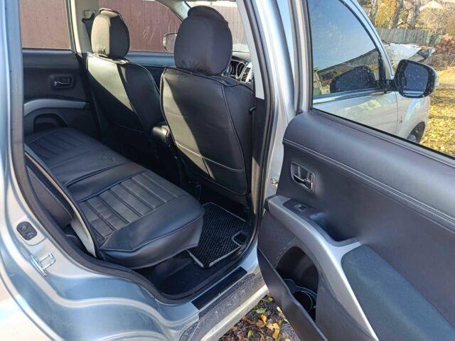 Мицубиси Аутлендер 2009 в Новгород-Северском на Automoto.ua Серый Мицубиси Аутлендер, объемом двигателя 2.2 л и пробегом 242 тыс. км за 11700 $, фото 7 на Automoto.ua