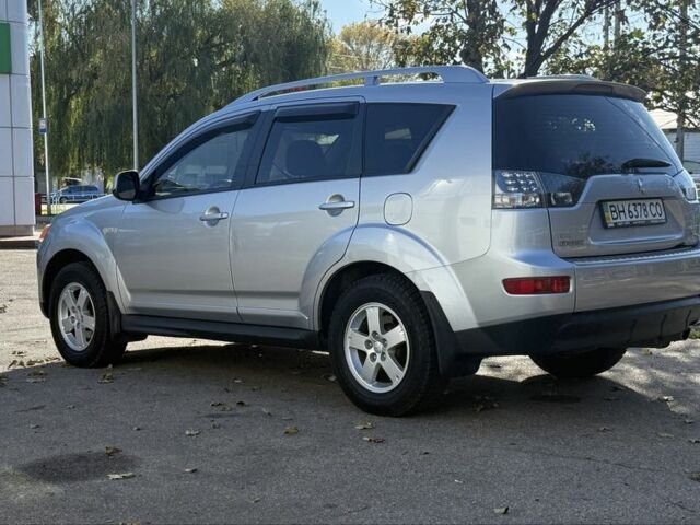 Серый Мицубиси Аутлендер, объемом двигателя 2.4 л и пробегом 43 тыс. км за 9500 $, фото 4 на Automoto.ua