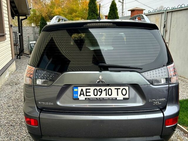 Серый Мицубиси Аутлендер, объемом двигателя 2.4 л и пробегом 153 тыс. км за 11500 $, фото 2 на Automoto.ua