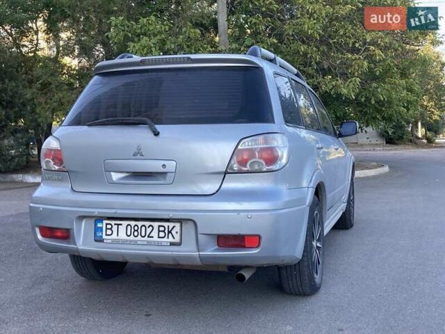Сірий Міцубісі Аутлендер, об'ємом двигуна 2 л та пробігом 214 тис. км за 6200 $, фото 4 на Automoto.ua