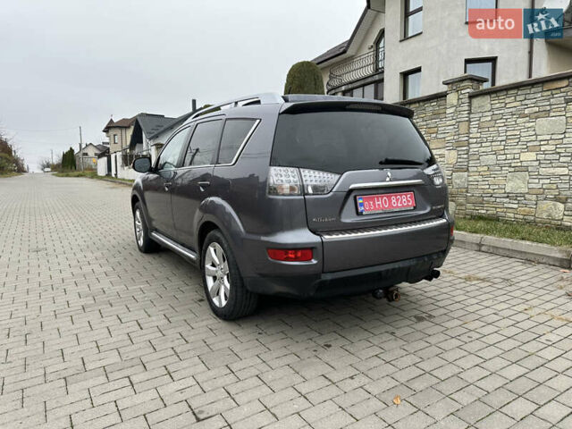Серый Мицубиси Аутлендер, объемом двигателя 2.2 л и пробегом 217 тыс. км за 10900 $, фото 5 на Automoto.ua