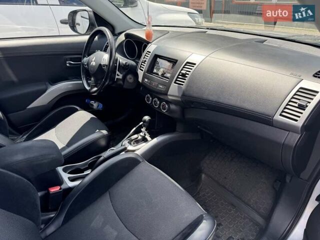 Серый Мицубиси Аутлендер, объемом двигателя 2.2 л и пробегом 223 тыс. км за 11500 $, фото 10 на Automoto.ua