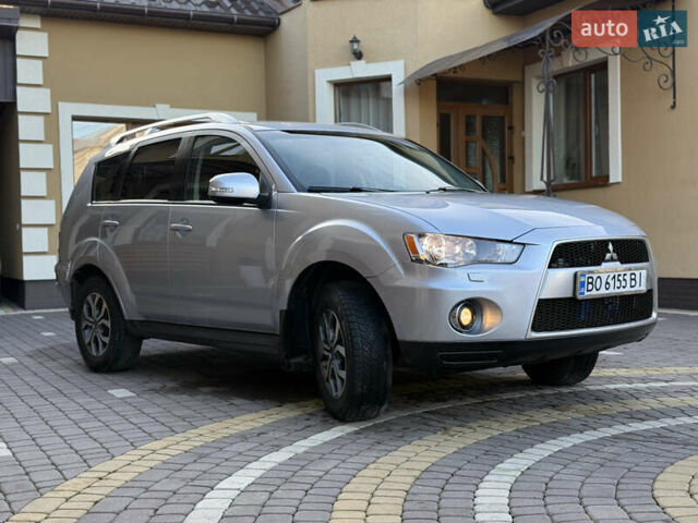 Серый Мицубиси Аутлендер, объемом двигателя 2.4 л и пробегом 218 тыс. км за 9950 $, фото 25 на Automoto.ua