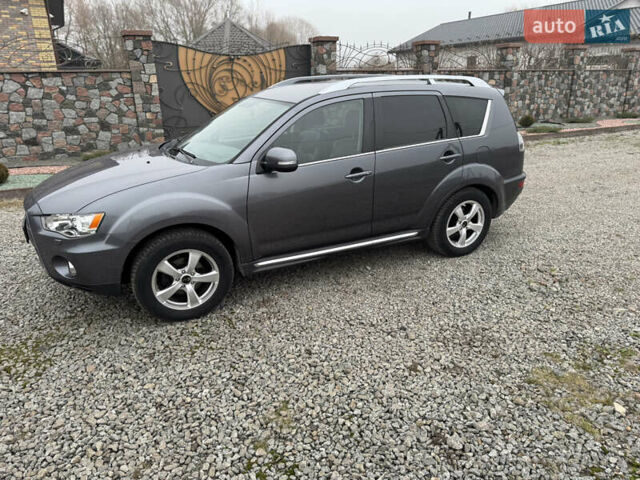 Серый Мицубиси Аутлендер, объемом двигателя 2.2 л и пробегом 289 тыс. км за 11300 $, фото 35 на Automoto.ua