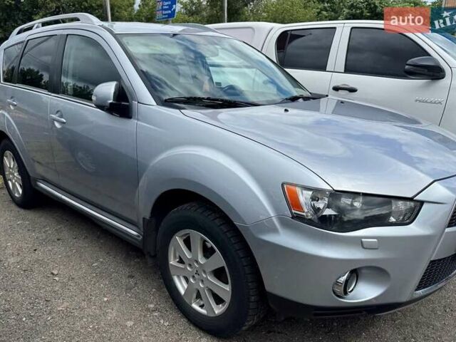 Серый Мицубиси Аутлендер, объемом двигателя 2.2 л и пробегом 223 тыс. км за 11500 $, фото 12 на Automoto.ua