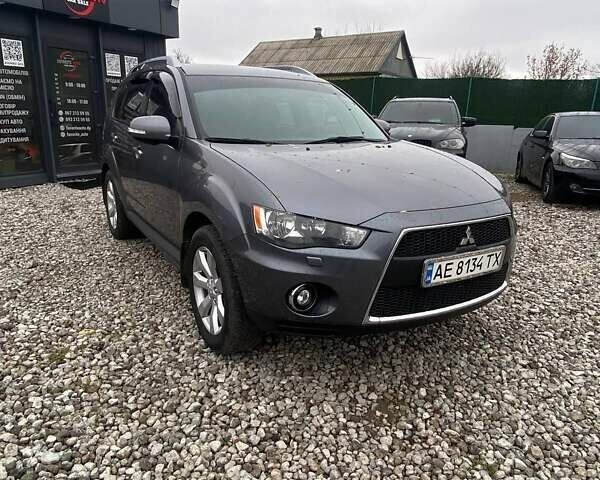 Серый Мицубиси Аутлендер, объемом двигателя 2.36 л и пробегом 143 тыс. км за 11500 $, фото 3 на Automoto.ua