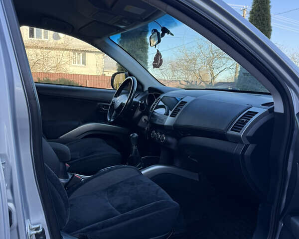 Серый Мицубиси Аутлендер, объемом двигателя 2.4 л и пробегом 218 тыс. км за 9950 $, фото 20 на Automoto.ua