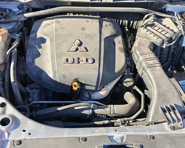 Серый Мицубиси Аутлендер, объемом двигателя 2.2 л и пробегом 236 тыс. км за 10500 $, фото 13 на Automoto.ua