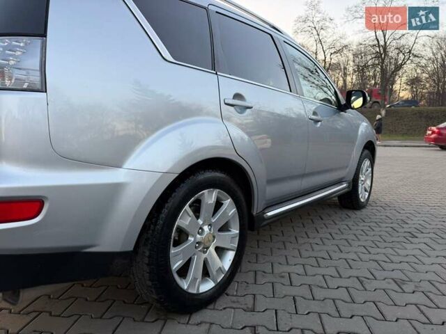 Серый Мицубиси Аутлендер, объемом двигателя 2.18 л и пробегом 294 тыс. км за 10799 $, фото 6 на Automoto.ua