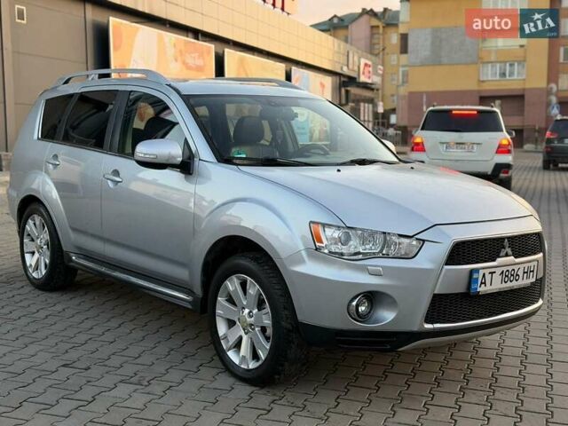 Серый Мицубиси Аутлендер, объемом двигателя 2.18 л и пробегом 294 тыс. км за 10799 $, фото 1 на Automoto.ua