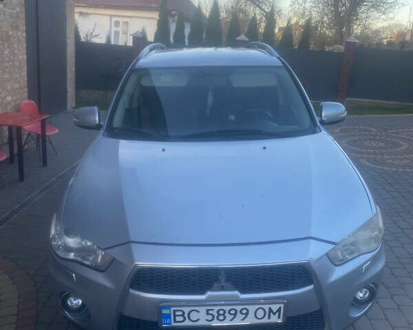 Серый Мицубиси Аутлендер, объемом двигателя 2 л и пробегом 286 тыс. км за 10300 $, фото 1 на Automoto.ua