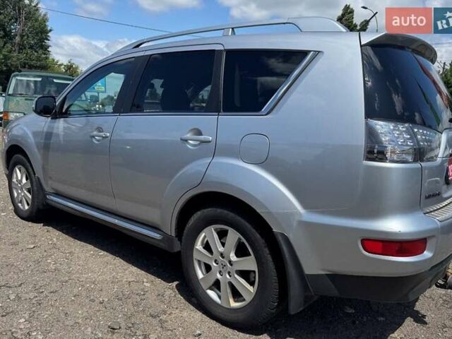 Серый Мицубиси Аутлендер, объемом двигателя 2.2 л и пробегом 223 тыс. км за 11500 $, фото 1 на Automoto.ua