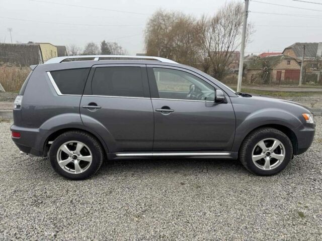 Серый Мицубиси Аутлендер, объемом двигателя 2.2 л и пробегом 289 тыс. км за 11300 $, фото 4 на Automoto.ua