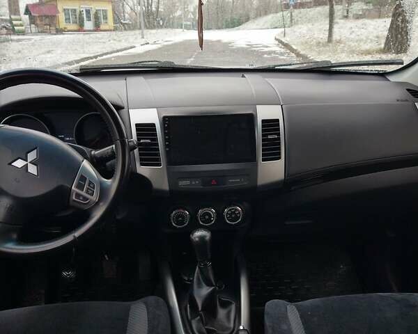 Сірий Міцубісі Аутлендер, об'ємом двигуна 2.4 л та пробігом 212 тис. км за 9500 $, фото 8 на Automoto.ua