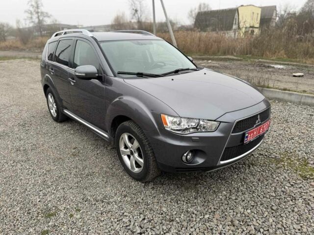 Серый Мицубиси Аутлендер, объемом двигателя 2.2 л и пробегом 289 тыс. км за 11300 $, фото 2 на Automoto.ua