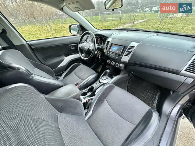 Серый Мицубиси Аутлендер, объемом двигателя 2.4 л и пробегом 270 тыс. км за 8450 $, фото 8 на Automoto.ua