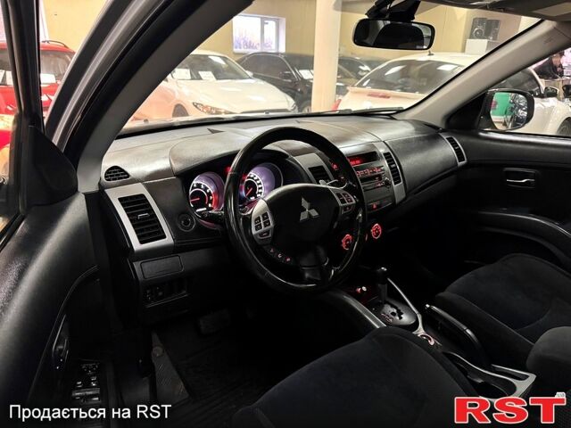 Серый Мицубиси Аутлендер, объемом двигателя 2.4 л и пробегом 182 тыс. км за 10800 $, фото 9 на Automoto.ua