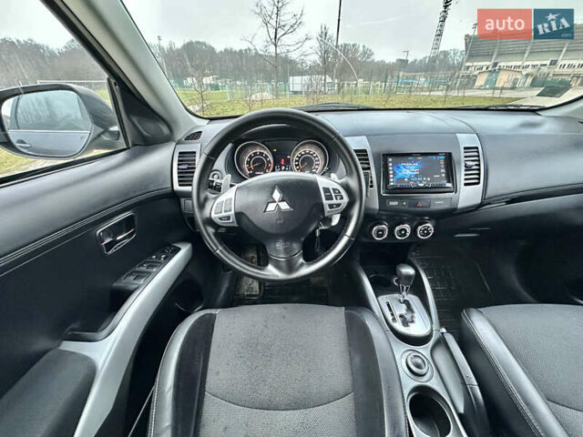 Серый Мицубиси Аутлендер, объемом двигателя 2.4 л и пробегом 270 тыс. км за 8450 $, фото 13 на Automoto.ua