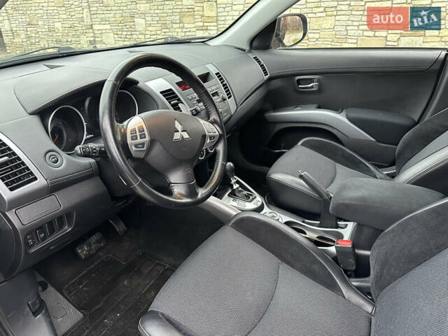 Серый Мицубиси Аутлендер, объемом двигателя 2.2 л и пробегом 217 тыс. км за 10900 $, фото 1 на Automoto.ua
