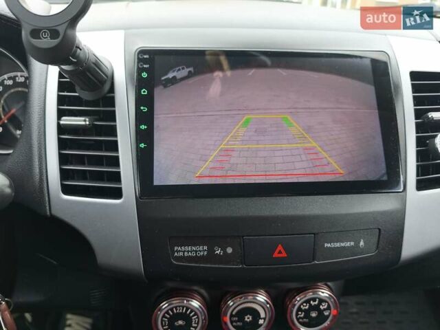 Серый Мицубиси Аутлендер, объемом двигателя 2.3 л и пробегом 263 тыс. км за 11400 $, фото 14 на Automoto.ua