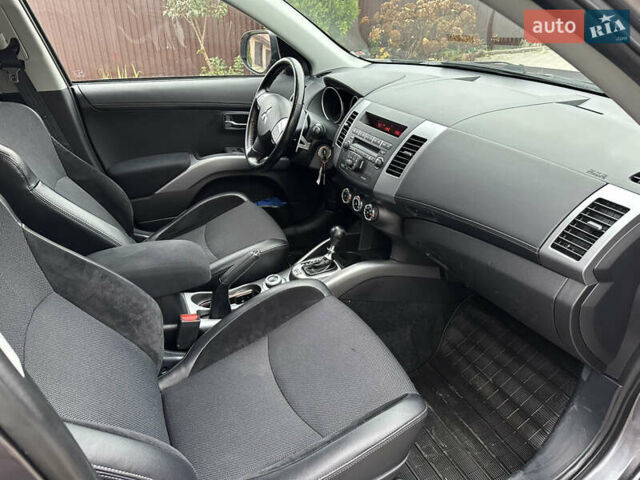Серый Мицубиси Аутлендер, объемом двигателя 2.2 л и пробегом 217 тыс. км за 10900 $, фото 11 на Automoto.ua