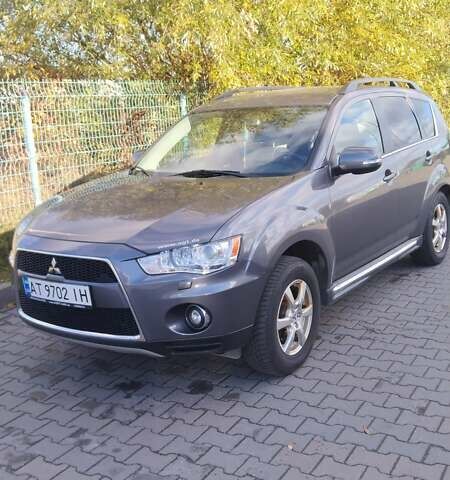 Серый Мицубиси Аутлендер, объемом двигателя 2.3 л и пробегом 294 тыс. км за 9600 $, фото 6 на Automoto.ua