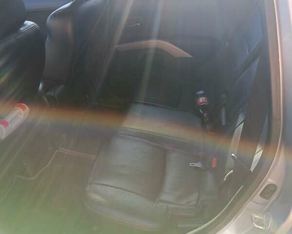 Серый Мицубиси Аутлендер, объемом двигателя 2.2 л и пробегом 236 тыс. км за 10500 $, фото 1 на Automoto.ua