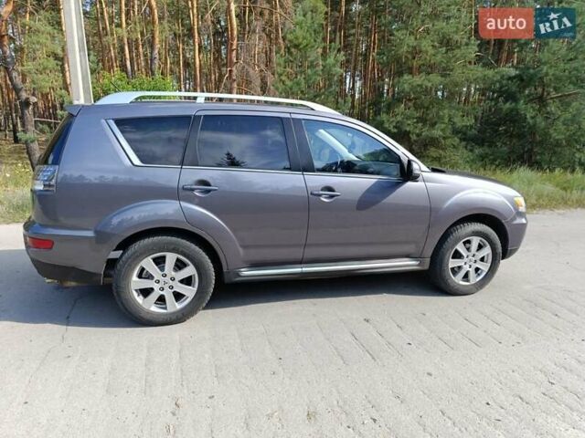 Серый Мицубиси Аутлендер, объемом двигателя 2.4 л и пробегом 220 тыс. км за 11800 $, фото 5 на Automoto.ua