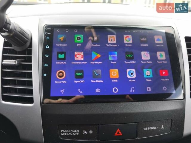 Серый Мицубиси Аутлендер, объемом двигателя 2.3 л и пробегом 263 тыс. км за 11400 $, фото 13 на Automoto.ua