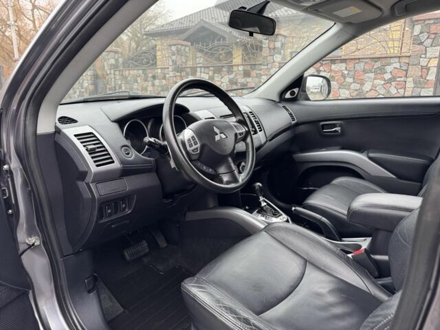 Серый Мицубиси Аутлендер, объемом двигателя 2.2 л и пробегом 289 тыс. км за 11300 $, фото 10 на Automoto.ua