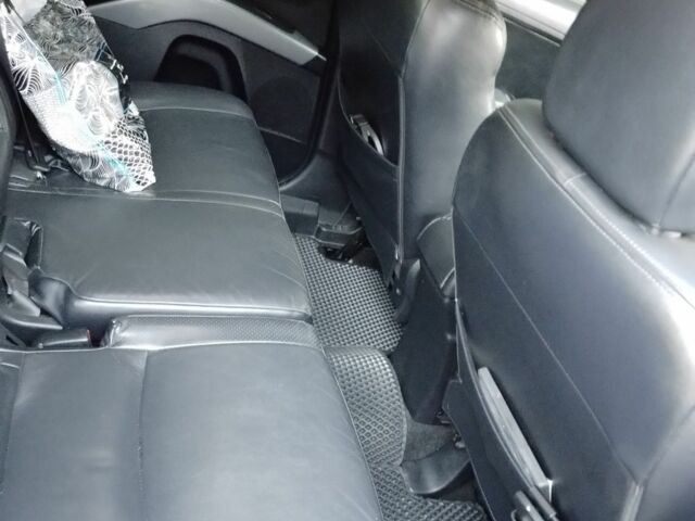 Серый Мицубиси Аутлендер, объемом двигателя 2.4 л и пробегом 151 тыс. км за 11100 $, фото 2 на Automoto.ua