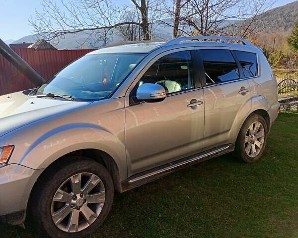 Серый Мицубиси Аутлендер, объемом двигателя 2.2 л и пробегом 236 тыс. км за 10500 $, фото 7 на Automoto.ua