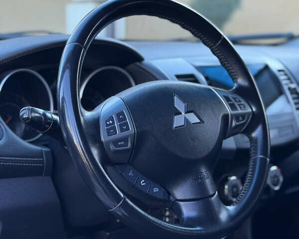 Серый Мицубиси Аутлендер, объемом двигателя 2.4 л и пробегом 218 тыс. км за 9950 $, фото 10 на Automoto.ua