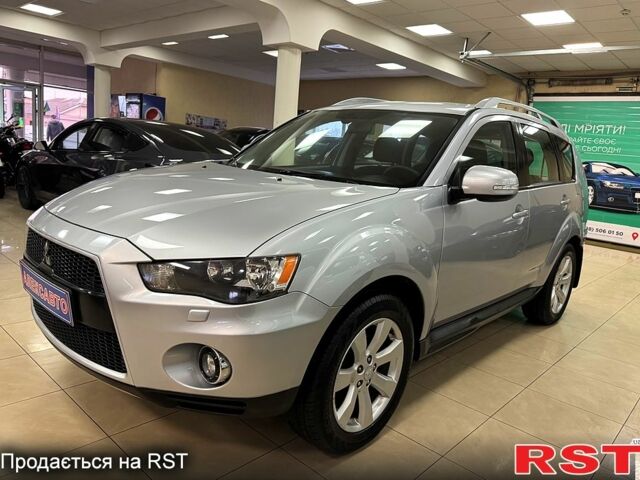 Серый Мицубиси Аутлендер, объемом двигателя 2.4 л и пробегом 182 тыс. км за 10800 $, фото 2 на Automoto.ua