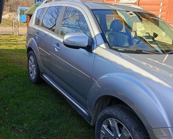 Серый Мицубиси Аутлендер, объемом двигателя 2.2 л и пробегом 236 тыс. км за 10500 $, фото 5 на Automoto.ua