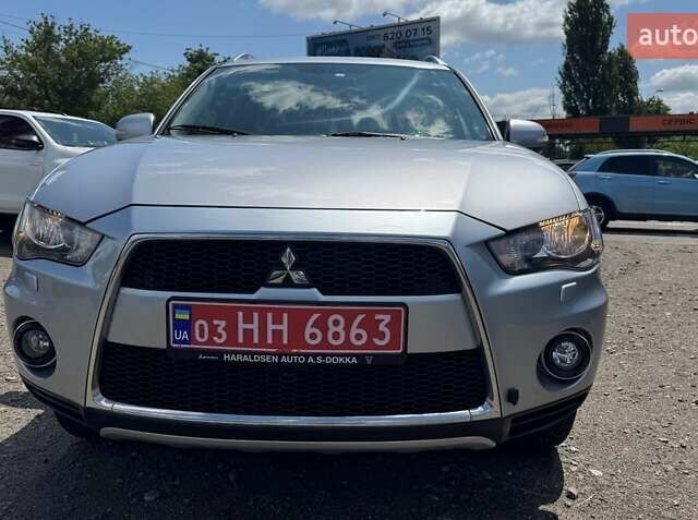 Серый Мицубиси Аутлендер, объемом двигателя 2.2 л и пробегом 223 тыс. км за 11500 $, фото 4 на Automoto.ua