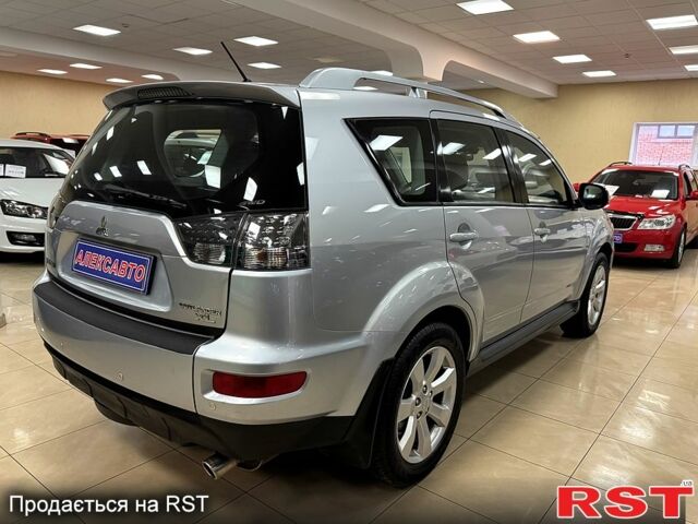 Серый Мицубиси Аутлендер, объемом двигателя 2.4 л и пробегом 182 тыс. км за 10800 $, фото 6 на Automoto.ua