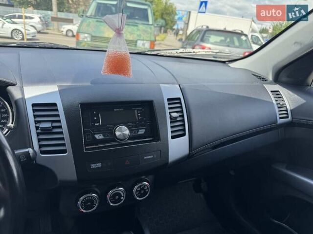 Серый Мицубиси Аутлендер, объемом двигателя 2.2 л и пробегом 223 тыс. км за 11500 $, фото 9 на Automoto.ua