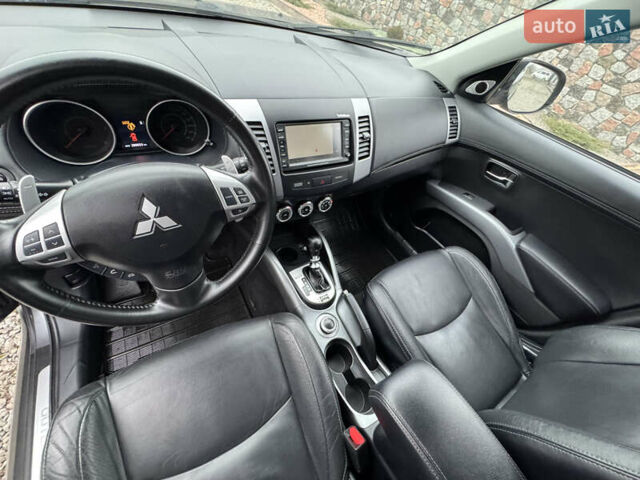 Серый Мицубиси Аутлендер, объемом двигателя 2.2 л и пробегом 289 тыс. км за 11300 $, фото 46 на Automoto.ua