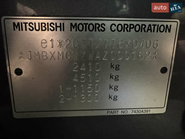 Серый Мицубиси Аутлендер, объемом двигателя 2.2 л и пробегом 289 тыс. км за 11300 $, фото 77 на Automoto.ua