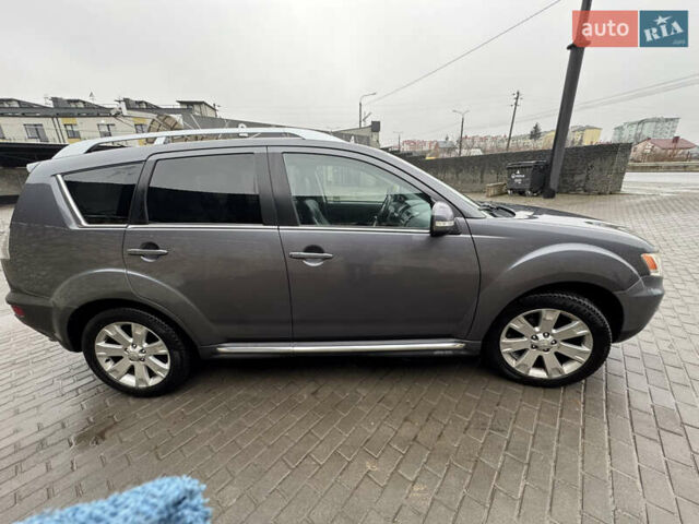 Серый Мицубиси Аутлендер, объемом двигателя 2.2 л и пробегом 230 тыс. км за 11000 $, фото 5 на Automoto.ua