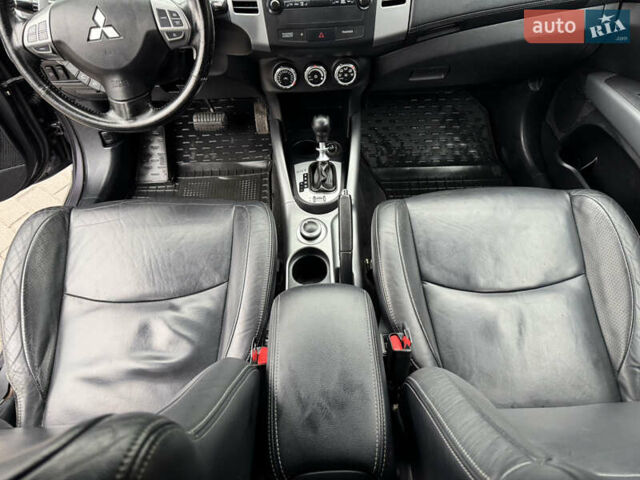 Серый Мицубиси Аутлендер, объемом двигателя 2.2 л и пробегом 230 тыс. км за 11000 $, фото 18 на Automoto.ua
