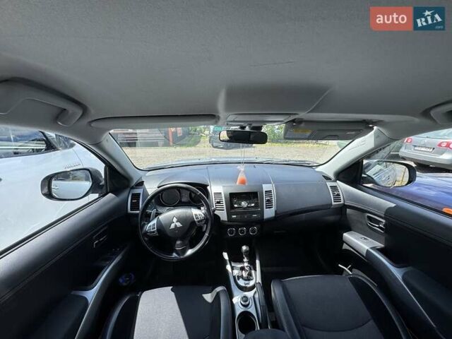 Серый Мицубиси Аутлендер, объемом двигателя 2.2 л и пробегом 223 тыс. км за 11500 $, фото 11 на Automoto.ua